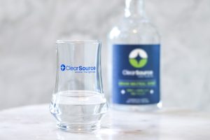 ClearSource produces grain neutral spirits, seen here in a glass.